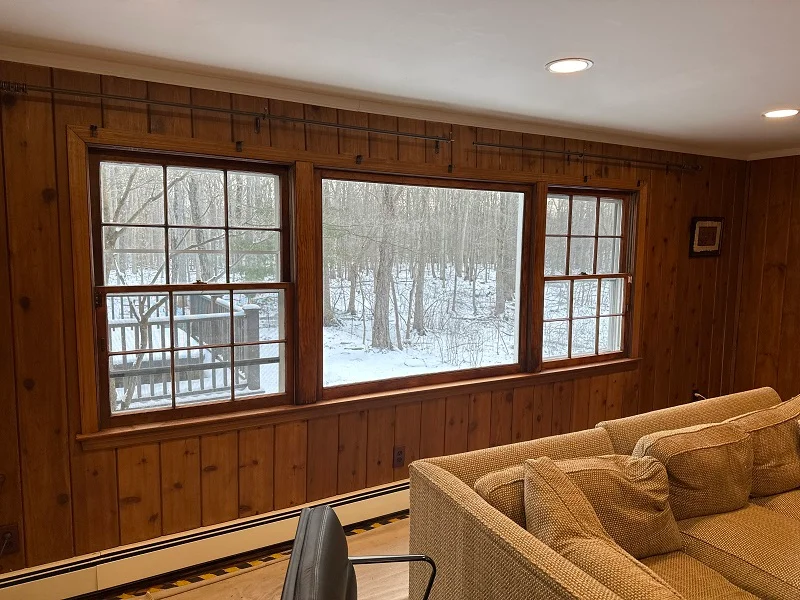 Old wood windows with a stained interior